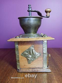 Antique German Coffee Grinder with Embossed Brass Floral Decoration