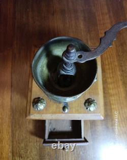 Antique German Coffee Grinder with Embossed Brass Floral Decoration