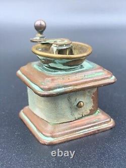 Antique Sewing Wind Up Tape Measure Figural Brass Copper Coffee Grinder c. 1900s