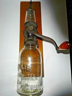 Antique Universal No. 24 Cast Iron And Glass Wall Mount Coffee Grinder