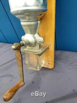 Antique Wall mounted coffee grinder art deco, cast aluminium. 1930s