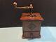 Antique old wooden coffee grinder