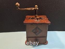 Antique old wooden coffee grinder