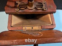 Antique old wooden coffee grinder