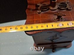 Antique old wooden coffee grinder