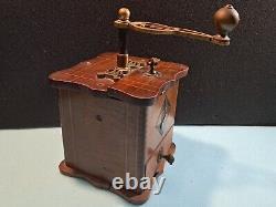 Antique old wooden coffee grinder