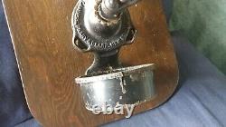 Vintage Cast Iron Universal Coffee Grinder withCup by Landers, Frary & Clark